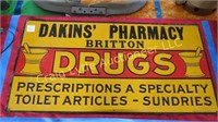 Original metal Dakins Pharmacy sign