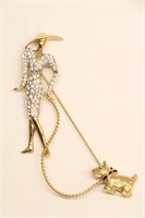 CAROLEE WOMAN WALKING DOG PIN