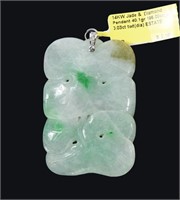 Large carved jade pendant, approx. 2.25" x 1 5/8",