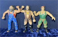 3-8in Rubber WWF figures  played with condition