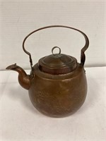 Small copper kettle.