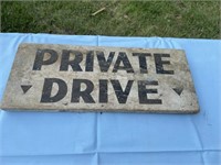 Old wooden private drive sign