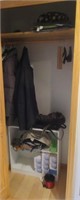 Contents of hall closet includes jackets, size