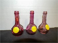 3 vintage ball and claw bitters bottles with corks