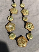 Green and brown ceramic necklace