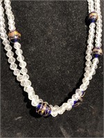 Double necklace with clear beads and dark blue