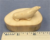 2 1/4" x 1 1/2" tall ivory carving of a seal mount