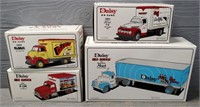 (4) First Gear Daisy Die Cast Trucks