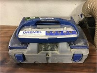 Dremel with attachments shown