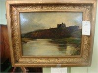 TOC oil on board of a castle in gilt frame.