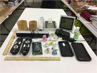 Household lot w/ phone cases, erasers, & remotes