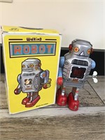 Vintage Wind-up Walking Sparking Tin Robot Toy