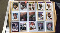 15 sports cards in the hard plastic sleeves