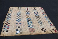 KNOTTED HAND-STITCHED QUILT W/ TEARS & STAINS