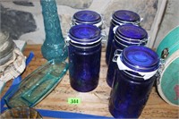 blue new jars  5 total. and blue bottler and dish