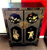 Black lacquer Asian cabinet with hardstone decor