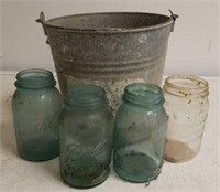 4 Fruit Jars and A  Galvanized Bucket