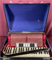 Red Hohner accordion