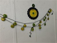 String of JD lights, driveway marker & wall plaque