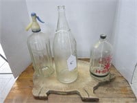 3 COLLECTIBLE BOTTLES AND PIG CUTTING BOARD