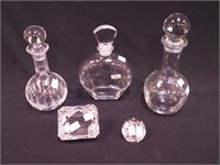 Three crystal decanters: 9", 9 1/2" and 11", one
