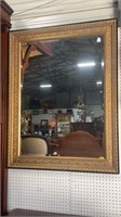 Beveled Mirror in Gold Carved Frame