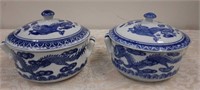 Two blue/white lided jars