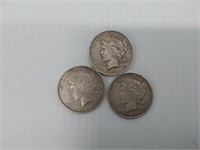 (3) Peace silver dollars