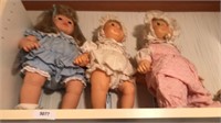 3 dolls top shelf
