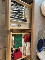 2 drawers w/ silverware & dish rags