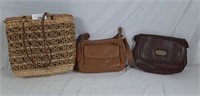 3 handbags. 1 is leather