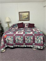 King size bed frame with star pattern quilt