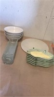 4 bowls with 2 sets of corn and cob plates