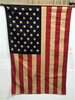 Vintage American flag on wood pole