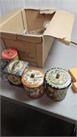 Old tins and candle  holders