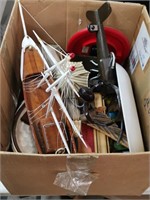 box of household items: decorative plane, etc.