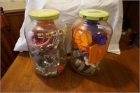 Two Pickle Jars Full of Cookie Cutters