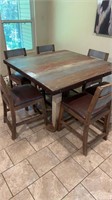 Table with 6 chairs
52x52.    3ft height