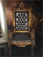 Ornate winged lion carved wood and leather throne