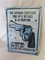 Blue metal gun warning sign