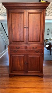 Tall solid wood storage cabinet by Bob Timberlake