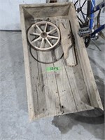 Wooden child's wagon needing repair