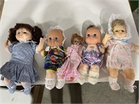 5 assorted dolls