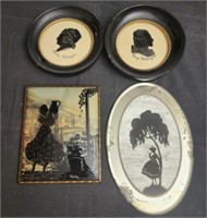 4 silhouette style framed photos and mirror