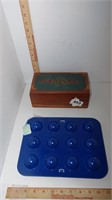 wooden box and golf ball holder