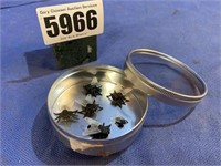 Plastic Flies In A Tin