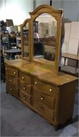 Oak veneer dresser with three drawers with bow