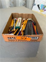 Box of pencils and pens