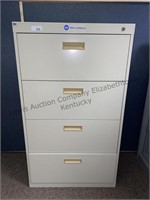 Four drawer filing cabinet all drawers function.