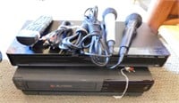 P729- DVD Player, VHS Player And 2 Microphones